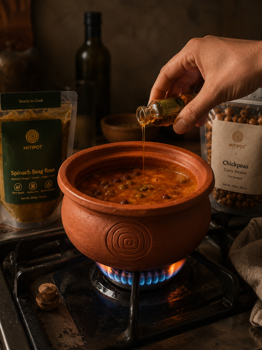 Tadka finishing oil being poured into the pot at the end of the cook